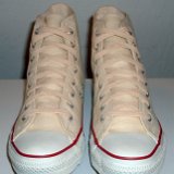 Natural White High Top Chucks  Angled front to top view of natural white high tops.