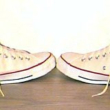 Natural (Unbleached) White High Top Chucks  Angled side view of natural white high tops.