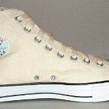 Natural (Unbleached) White High Top Chucks  Inside patch view of a left graphic star high top.