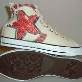 Natural (Unbleached) White High Top Chucks  Outside and sole views of graphic star high top chucks.