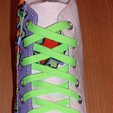 Classic Neon Laces  White graffiti high top with neon lime laces.