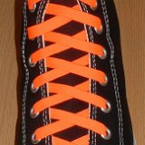 Classic Neon Shoelaces  Black high top with neon orange laces.
