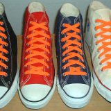 Classic Neon Shoelaces  Core color high tops with neon orange laces.