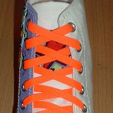 Classic Neon Shoelaces  White graffiti high top with neon orange laces.