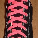 Classic Neon Shoelaces  Black high top with neon pink laces.