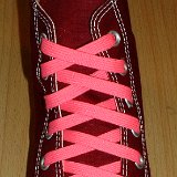 Classic Neon Shoelaces  Maroon high top with neon pink laces.