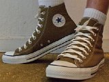 olivehi13  Wearing olive green high top chucks, left view 1.