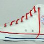 Optical White High Top Chucks  Inside patch view of a right optical white high top with narrow red laces.