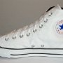 Optical White High Top Chucks  Inside patch view of a right white and black rolldown high top.