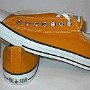 Orange Chucks  Brand new gold low cuts, side and rear views.