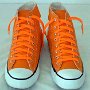 Orange Chucks  Orange high tops with orange laces, front and top view.