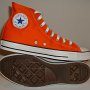 Orange Chucks  Inside patch and sole views of orange high tops.