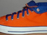 Orange and Royal Foldover High Top Chucks  Outside view of a left orange and royal blue high top rolled down to the seventh eyelet.