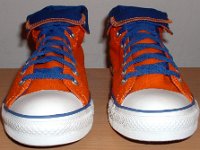 Orange and Royal Foldover High Top Chucks  Front view of orange and royal blue high tops rolled down to the seventh eyelet.