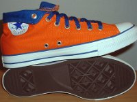 Orange and Royal Foldover High Top Chucks  Sole and inside patch views of orange and royal blue high tops rolled down to the seventh eyelet.