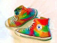 Hand Painted or Tie-Dyed High Top Chucks  Worn tie dyed optical white high tops, angled side views.