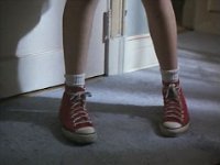 The Paperboy  Closeup of Johnny's red high top chucks in the hall, shot 2.