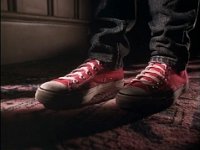 The Paperboy  Closeup of Johnny's high tops as he lurks outside  Mrs. Rosemont's room.