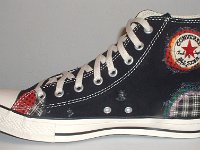 Patchwork High Top and Low Cut Chucks  Inside patch view of a right black high top.