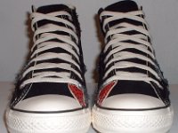 Patchwork High Top and Low Cut Chucks  Front view of a pair of black high tops.