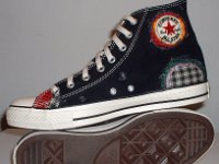 Patchwork High Top and Low Cut Chucks  Inside patch and sole views of a pair of black high tops.
