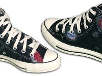 Patchwork High Top and Low Cut Chucks  Angled side views of a pair of black high tops.