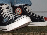 Patchwork High Top and Low Cut Chucks  Wearing black patches high tops, side view.
