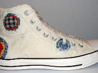 Patchwork High Top and Low Cut Chucks  Outside view of a right natural white high top.