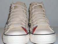 Patchwork High Top and Low Cut Chucks  Front view of a pair of natural white high tops.