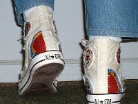 Patchwork High Top and Low Cut Chucks  Stepping up in white patches high tops, rear view.