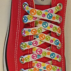 Peace Sign Shoelaces for Chucks  Peace Sign shoelace on a red low top chuck.