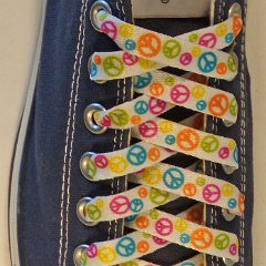 Peace Sign Shoelaces for Chucks  Peace Sign shoelace on a navy blue low top chuck.