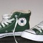 Pine Green HIgh Top Chucks  Left side view of pine green high top chucks.