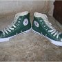 Pine Green HIgh Top Chucks  Angled front view of pine green high top chucks.