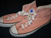 Pink High Top and Low Cut Chucks  Left side view of peach pink high top chucks.