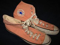 Pink High Top and Low Cut Chucks  Right side view of peach pink high top chucks.