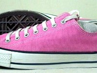 Pink High Top and Low Cut Chucks  Pink low cuts, side and sole views.