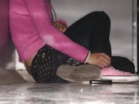 Pink High Top and Low Cut Chucks  Seated on the floor wearing pink high top chucks.