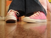 Pink High Top and Low Cut Chucks  Seated on the floor wearing pink high top chucks.