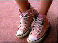 Pink High Top and Low Cut Chucks  Wearing pink high top chucks, angled top view.