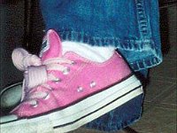 Pink High Top and Low Cut Chucks  Wearing pink low cuts.