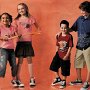 Chucks Worn By Prre-Teen Boys and Girls in Ads  Girls wearing black and pink foldover high tops and boys wearing black high top and low top chucks.