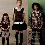 Chucks Worn By Prre-Teen Boys and Girls in Ads  Ad with three preteens wearing black low top, black extra high, and dark red chucks.
