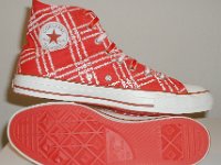 Product Red High Top Chucks  Inside patch and sole views of Product Red high tops with red and white reversible shoelaces.