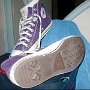 Purple HIgh Top Chucks  Angled inside patch and sole views of light purple high tops.