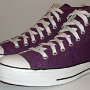 Purple High Top Chucks  Angled side view of purple passion high tops.