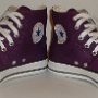 Purple High Top Chucks  Angled front view of purple passion high tops.