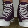 Purple High Top Chucks  Wearing purple passion high tops, front view 1.