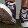Purple High Top Chucks  Wearing purple passion high tops, front view 2.