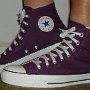 Purple High Top Chucks  Wearing purple passion high tops, left side view 1.